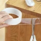 Багаторазова кріпильна стрічка - липучка для кріплення Ivy Grip Tape двосторонній скотч 5м на гелієвій основі Кріпиться на будь-які поверхні Прозорий - зображення 8