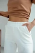 Женские спортивные штаны ONIOS Sport pants for women молочные M 983307 - изображение 4