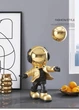 Статуэтка космонавт с шариком. Фигурка астронавта золотого цвета 48 х 30 х 35 см - изображение 2