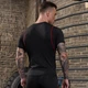Чоловічий компресійний спортивний комплект тайтси + футболка Ironbull Pro 91204 L (Black Red) - зображення 10