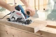 Циркулярная пила Bosch Professional GKS 55+ GCE,1300 вт, 63 мм глубина реза + диск Standard for Wood speed (0601682100) - изображение 9