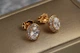 Серьги гвоздики Xuping Jewelry овальные малинки с белыми камнями 10 мм золотистые - изображение 1