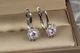 Серьги Xuping Jewelry хризантема 1.7 см серебристые - изображение 2