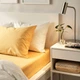 Простирадло на резинці IKEA NATTJASMIN 80х200 см жовте (005.434.36) - зображення 2