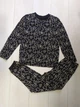 Піжама для хлопчика (кофта+штани) чорна з написом Neutral Chill Vibes George 122-128см (400092427) - зображення 1