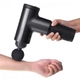 Ударный массажный пистолет для тела Fascial Gun Black для спины и всего тела мышечный массажер с 4 насадками - изображение 6