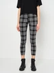 Брюки женские H&M Divided 0801384 32 Черные с белым (7000000000347) - изображение 1
