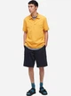 Поло длинное мужское Uniqlo 71772163 XS Оранжевое (1159786475) - изображение 1