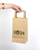 Пакет на Новый год 2024 eko-kraft 150х90х240 мм 10 шт/уп маленький Крафт пакетик с ручками для гостинцев и сувениров на "Символ Дракон" - изображение 2