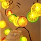Светодиодная новогодняя гирлянда "Фрукты" 12 LED, 5м + переходник, 220V, IP44, Теплый белый - изображение 2