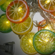 Светодиодная новогодняя гирлянда "Фрукты" 12 LED, 5м + переходник, 220V, IP44, Теплый белый - изображение 7