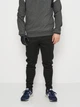 Спортивні штани чоловічі Joma Stripe 500422.111 S Чорні (8445456784579) - зображення 1