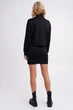 Трикотажний костюм гольф + міні спідниця з розпоркою Подіум 28200-BLACK S Чорний - зображення 2