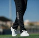 Женские спортивные штаны Joma CHAMPION IV Черный S (900450.100) - изображение 2