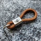 Плетеный кожаный брелок с логотипом MINI цвет Коричневый (1026B_1) - изображение 1
