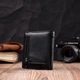 Універсальна модель гаманця з натуральної шкіри ST Leather 19474 Чорний - зображення 6