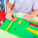 Książeczka kreatywna Roter Kafer BusyBook Kaczątko z zapięciami (5903858961224) - obraz 2