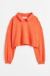 Світшот укорочений для дівчинки H&M 1126691-009 146-152 см (10-12 years) помаранч - зображення 1