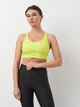 Спортивный топ для бега женский Puma Sports Bras 52507439 XS Лимонный (4099685438587) - изображение 1