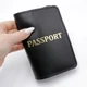 Обкладинка на паспорт шкіряна "Passport" чорна з золотистим гравіюванням - зображення 1