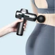 Перкуссионный массажный Пистолет на аккумуляторе Massage Gun для всего Тела с 6 Массажными Головками, 6 режимов, 18W (CG18) - изображение 5