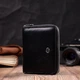 Кожаный женский кошелек на молнии с металлическим логотипом производителя ST Leather 19483 черный. - изображение 6