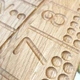 Навчальна Дерев'яна Дошка Монтессорі з цифрами Threewood з 55 вовняними кульками для дітей від 3 років, розміром 40x20см - изображение 8