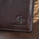 Вертикальный глянцевый портмоне с накладной монетницей GRANDE PELLE 11330 - изображение 9