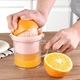 Портативна ручна соковижималка соковитискач JUICER для цитрусових з чашею - зображення 1