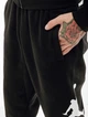 Брюки мужские Jordan Essentials Fleece Baseline Trousers M Чорний FD7345-010 - изображение 3