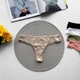 Женские трусы стринги Ouno 6504 c кружевом, Коричневые L/XL - изображение 1