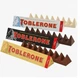 Шоколад Toblerone молочний з медом, мигдалем та нугою 100г (57794) - изображение 2