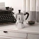 Кавоварка гейзерна Bialetti Moka Express 4TZ silver-black - изображение 4
