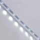 Світлодіодна лінійка SMD 3030 18LED/m 12V IP20 з лінзою 30° 6000К - зображення 2