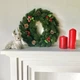 Рождественский венок "Elegant" из искусственной хвои, d-50 см, зеленый с шишками, калиной и красными яблочками - изображение 4