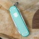 Складной нож-брелок VICTORINOX Classic Alox Minty Mint 5 функций 4 см, нержавеющая сталь X50CrMoV15 - изображение 6