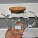 Заварочный чайник из жаропрочного стекла с бамбуковой крышкой "Стокгольм", 1000 мл - изображение 11