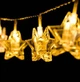 Світлодіодна новорічна гірлянда "Прищіпки-зірочки" 12 LED, 5м + перехідник, 220V, IP44, Теплий білий - зображення 2