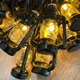 Светодиодная гирлянда "Ретро фонарики" 5м, 12 LED, от сети 220В, черный провод, Теплый белый - изображение 8