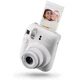 Подарунковий комплект Fujifilm Instax Mini 12 Clay White з фотоапаратом, чохлом, альбомом на 108 фото, плівкою та фоторамкою (Подарункове пакування) - зображення 4