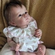 Реборн Лялька Дівчинка Reborn Baby м'яконабивна 45 см з прошитим волоссям - зображення 4