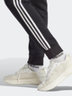 Spodnie dresowe męskie adidas Fleece 3-Stripes Tapered Cuff IB4030 L Czarne (4066762310104) - obraz 5