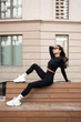 Спортивний жіночий костюм Hot з подвійним пуш-ап ефектом для фітнесу та йоги (рашгард + легінси) Однотонний V-пояс Push Up XS-S Чорний (MA010000S) - зображення 8