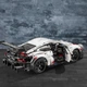 Конструктор LEGO TECHNIC Porsche 911 RSR 1580 деталей (42096) - изображение 10