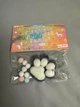 Игрушка-антистересс Squishy Сквиши Таба Лапка Котика чорно белая пушистая 5,5 см - изображение 1