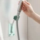 Тримач для душу однотонний універсальний, що обертається, на присоску Shower holder,світло-зелений - зображення 2