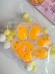 Игрушка Сквиши Лапка Котика 7 см прозрачная с оранжевым (22599) - изображение 1