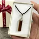 Кулон с натуральным камнем Тигровый глаз коричневый прямоугольной формы на шнурке экошелк черный упакован в коробочку (16117) - изображение 3