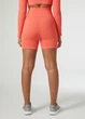 Шорты женские Helly Hansen Allure Seamless Bike Shorts M Помаранчевий 53932-284 - изображение 2