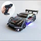 Радиоуправляемая машинка для дрифта Nissan GT-R 4WD: 2 скорости, неоновая подсветка, 20 см Черный - изображение 1